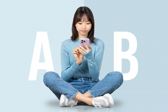 A案とB案で悩む女性